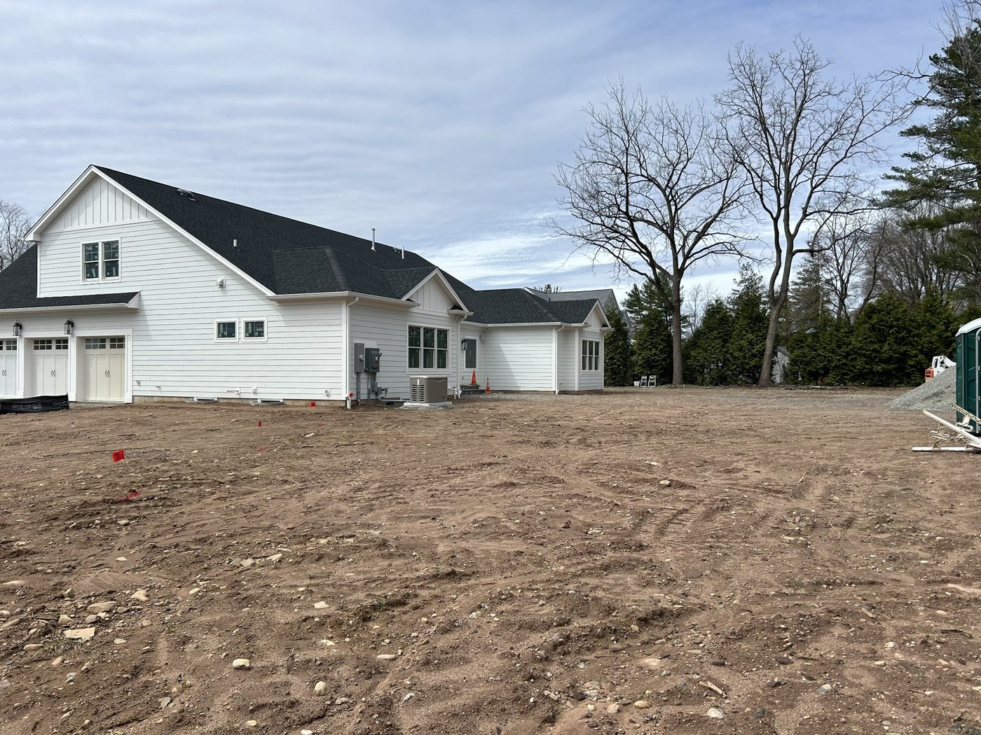 Before landscape construction image showing unfinished backyard project area in Ringwood NJ